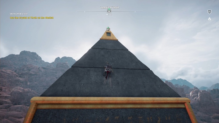 Kryształ ten musisz umieścić na górze obelisku, który znajduje się dokładnie naprzeciwko drzewa - Okruchy gwiazdy | Zadanie poboczne | Solucja - Assassins Creed Origins - poradnik do gry