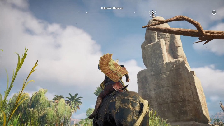 Na początku misji musisz porozmawiać z mężczyzną stojącym na samym szczycie wielkiego posągu - Nekropolia w Tebach | Zaświaty i zadania poboczne - Assassins Creed Origins - poradnik do gry