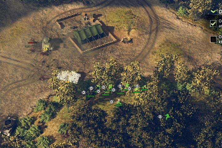Oddział piechoty wykorzystał gęsty las, aby niepostrzeżenie przekraść się do pozycji wroga i wyeliminować jednostki przeciwnika. - Atakowanie | Prowadzenie bitew | Sudden Strike 4 - Sudden Strike 4 - poradnik do gry