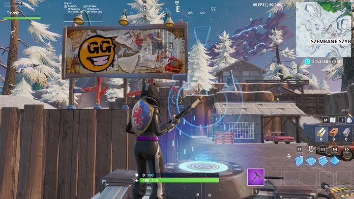 Pierwszy szyld (billboard) znajduje się przy wejściu do tuneli Szemranych Szybów - Odwiedź pomalowane billboardy w jednym meczu | Wyzwanie sezonu 10 Fortnite - Fortnite: Battle Royale - poradnik do gry