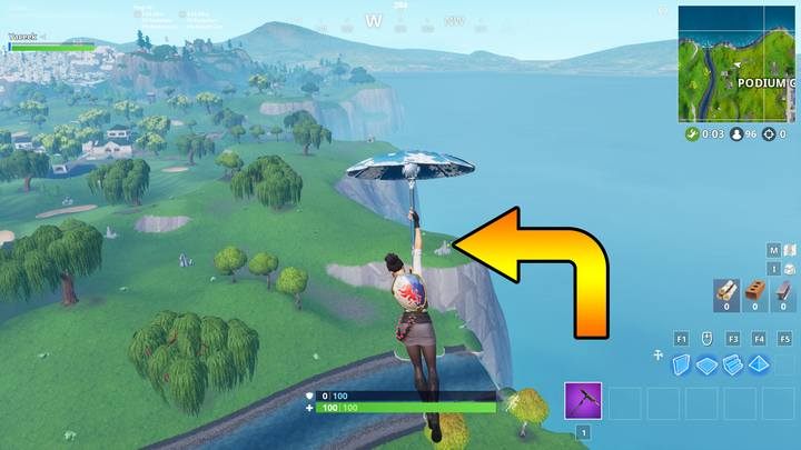 Trzeci balon znajdziesz przy ujściu rzeki, w północnej części mapy, między Golfowym Gniazdkiem, a Podium - Wyzwanie - Przekłuj 10 złotych balonów - Fortnite: Battle Royale - poradnik do gry