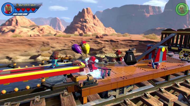 Trzeci zestaw balonów znajdziesz na wagonie, na którym znajduje się przeciwnik główny w misji, czyli Kapitan Corbett - Sekrety Misja 6 - O kurczę | LEGO Marvel Super Heroes 2 - LEGO Marvel Super Heroes 2 - poradnik do gry