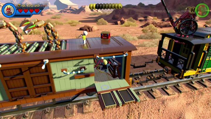 W trakcie przejścia przez wagon z wężami spadnij na mały podest na jego końcu - Sekrety Misja 6 - O kurczę | LEGO Marvel Super Heroes 2 - LEGO Marvel Super Heroes 2 - poradnik do gry