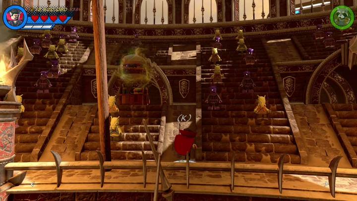 Po prawej stronie areny, na trybunach znajdziesz wielkiego hamburgera - Sekrety Misja 15 - Red King i jego ring | LEGO Marvel Super Heroes 2 - LEGO Marvel Super Heroes 2 - poradnik do gry