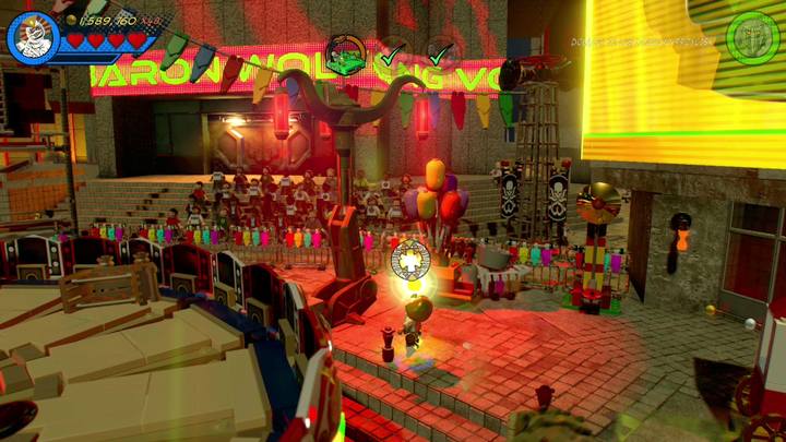 Różowy klocek otrzymasz w momencie zniszczenia trzech stoisk z balonami - Misja 6 - Potworna parada | Misje Gwenpool | Solucja LEGO Marvel Super Heroes 2 - LEGO Marvel Super Heroes 2 - poradnik do gry