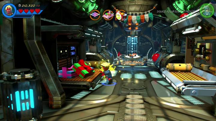 Na łóżku po lewej stronie, w centralnej części statku, znajdziesz kolorowe prezenty - Misja 9 - Potańcówka | Misje Gwenpool | Solucja LEGO Marvel Super Heroes 2 - LEGO Marvel Super Heroes 2 - poradnik do gry