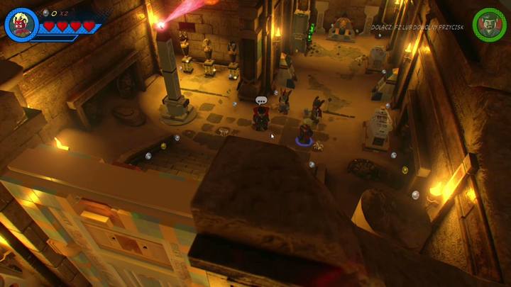 Na początku skorzystaj z laserów postaci Kapitan Marvel i zniszcz złote statuetki po lewej stronie - Misja 17 - Chyba widziałem kotecka | Solucja LEGO Marvel Super Heroes 2 - LEGO Marvel Super Heroes 2 - poradnik do gry