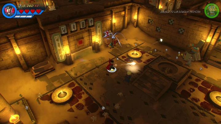 W następnym pomieszczeniu zniszcz posąg Anubisa i skorzystaj z ukrytej pod nim platformy jako Doktor Strange, by narysować odpowiedni kształt - Misja 17 - Chyba widziałem kotecka | Solucja LEGO Marvel Super Heroes 2 - LEGO Marvel Super Heroes 2 - poradnik do gry