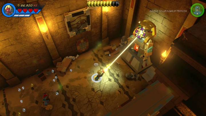 Korzystając z dowolnej postaci przeskocz przez pole z pułapkami, zabij skorpiona i naciśnij przycisk znajdujący się po lewej stronie - Misja 17 - Chyba widziałem kotecka | Solucja LEGO Marvel Super Heroes 2 - LEGO Marvel Super Heroes 2 - poradnik do gry