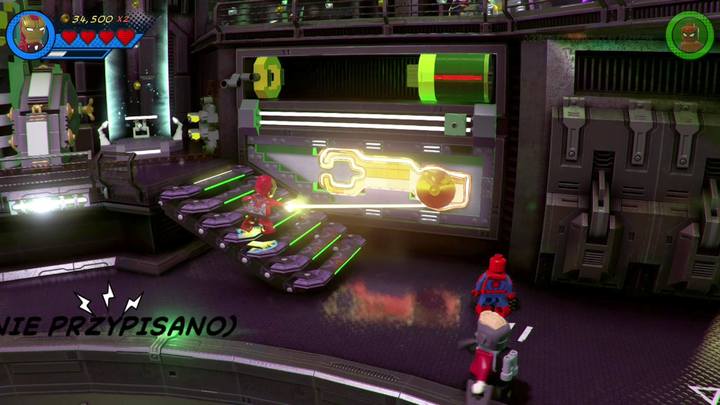 Przejdź teraz na schody po prawej stronie i użyj Iron Mana żeby zniszczyć złotą osłonę - Misja 19 - Na ostrzu miecza | Solucja LEGO Marvel Super Heroes 2 - LEGO Marvel Super Heroes 2 - poradnik do gry