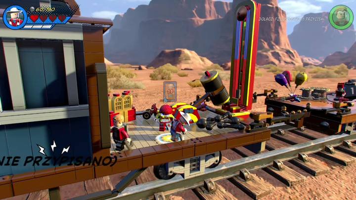 Korzystając z postaci Kid Colta przedostań się do pokazanego na obrazku miejsca i użyj lassa na zaczepie, by obniżyć mały pomost, który zaprowadzi cię na drugą stronę - Misja 6 - O kurczę | Solucja LEGO Marvel Super Heroes 2 - LEGO Marvel Super Heroes 2 - poradnik do gry