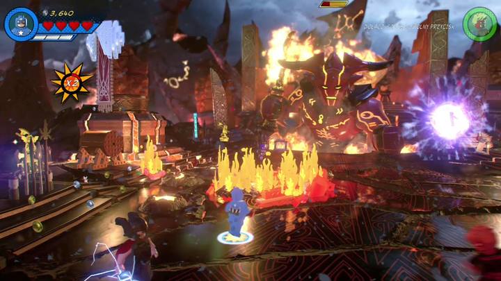 Po wykonaniu tego kroku zmień postać na Kapitana Amerykę i podejdź do pokazanego na obrazku pożaru - Misja 7 - Nerwowa natura Surtura | Solucja LEGO Marvel Super Heroes 2 - LEGO Marvel Super Heroes 2 - poradnik do gry