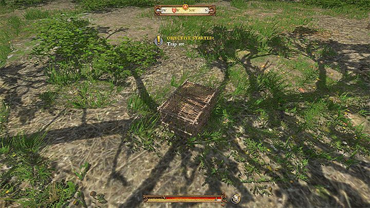 Wyrzucona z inwentarza klatka powinna wylądować na ziemi - przykład na obrazku - Ptaszek w garści.... | Zadania poboczne Kingdom Come - Kingdom Come Deliverance - poradnik do gry