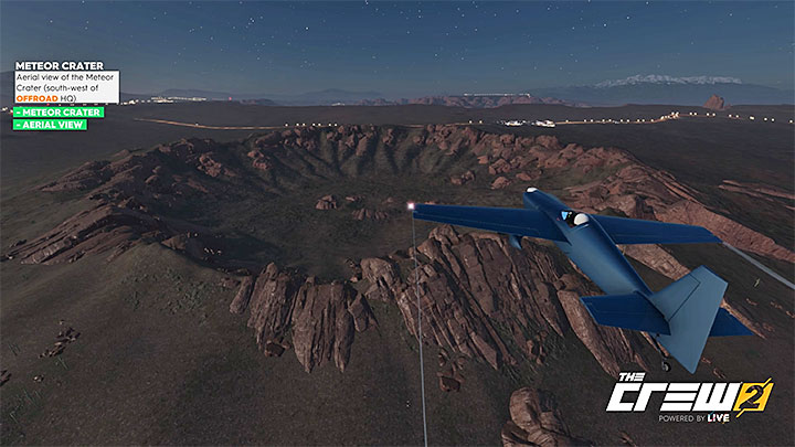 Opis: Widok z powietrza na krater meteorytowy (na południowy-zachód od kwatery Offroadu) - Album - Offroad | Zadań fotograficznych w The Crew 2 - The Crew 2 - poradnik do gry
