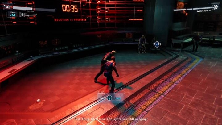 Zeskoczcie na dół, a dotrzecie do pomieszczenia z licznikiem odliczającym czas - Marvels Spider-Man: Wydarzenie wieczoru (The Main Event) - solucja, opis przejścia - Marvels Spider-Man - poradnik do gry