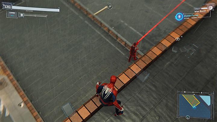 Uważajcie w tej lokacji na snajperów, których rozpoznacie po wiązkach laserów - Marvels Spider-Man: Dwa w jednym (Dual Purpose) - solucja, opis przejścia - Marvels Spider-Man - poradnik do gry