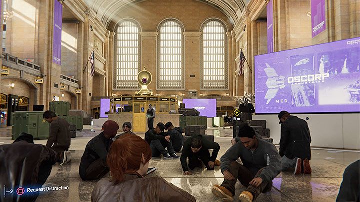 Wskażcie Peterowi centralny obiekt i poproście go o odwrócenie uwagi strażników (kwadrat na padzie) - Marvels Spider-Man: Ten, który uciekł (The One That Got Away) - solucja, opis przejścia - Marvels Spider-Man - poradnik do gry