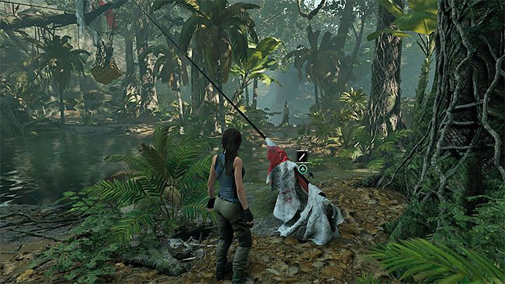 Wypłyń na powierzchnię i użyj nowo pozyskanego noża do podjęcia próby przecięcia liny pokazanej na obrazku - Jak odzyskać stracony nóż, łuk i czekan w Shadow of the Tomb Raider? - Shadow of the Tomb Raider - poradnik do gry