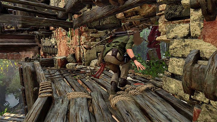 Doskocz do nowej krawędzi, ale nie wspinaj się od razu, bo w miejscu tym pracuje jeden z mechanizmów - pokazuje go obrazek 1 - Jak zaliczyć Próbę Orła w Shadow of the Tomb Raider? - Shadow of the Tomb Raider - poradnik do gry