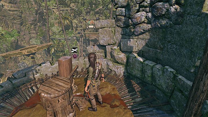 Udaj się na lewo od mostu i wdrap się po murze na wieżę - Jak rozwiązać zagadkę z mostem w peruwiańskiej dżungli? | Tomb Raider - Shadow of the Tomb Raider - poradnik do gry