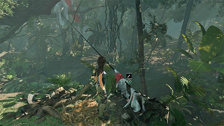 Przecięcie pierwszej liny nie załatwi ostatecznie sprawy, bo ładunek podtrzymuje jeszcze druga lina - Odzyskanie noża i łuku - Solucja Shadow of the Tomb Raider - Shadow of the Tomb Raider - poradnik do gry