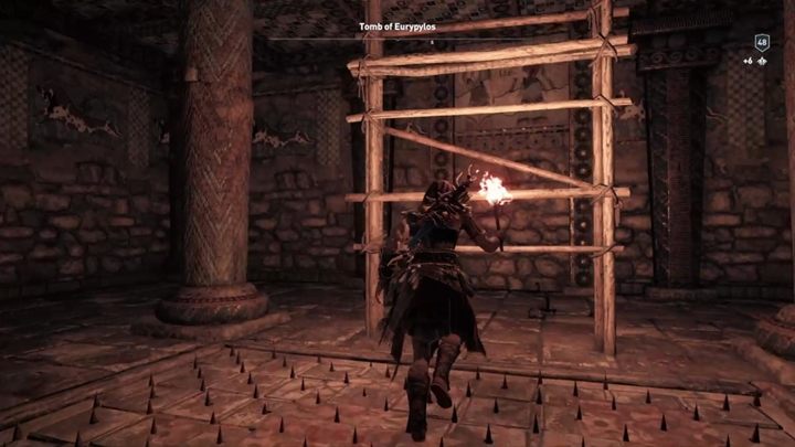 Uważając na pułapkę, wespnij się po drewnianym rusztowaniu wyżej - Grobowce w regionie Achaja - Assassins Creed Odyssey - poradnik do gry