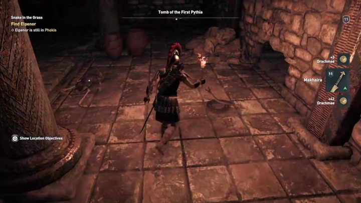 Na ścianie obok znajdziesz kolejną dziurę - zabij węża i wejdź do niej - Grobowce w Fokida - Assassins Creed Odyssey - poradnik do gry