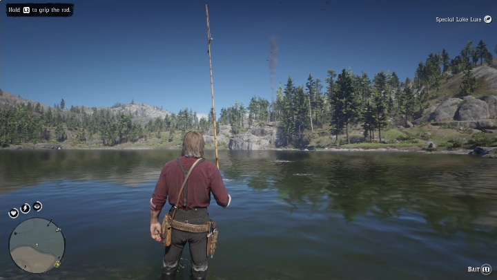 W tym przypadku najlepiej stanąć na w miejscu pokazanym na screenie powyżej, koło innych rybaków - Red Dead Redemption 2: Legendarny Bass małogębowy - mapy, porady - Red Dead Redemption 2 - poradnik do gry