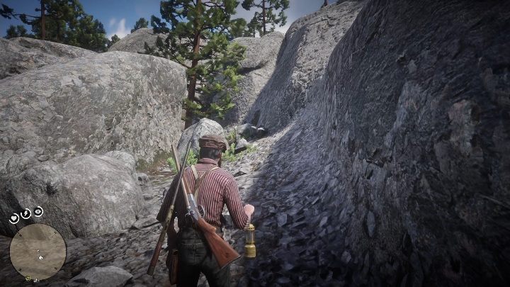 Wejdź w przejście pomiędzy skałami i powoli kieruj się ku górze - Red Dead Redemption 2: Zagadka z dziwnymi posągami, porady - Red Dead Redemption 2 - poradnik do gry