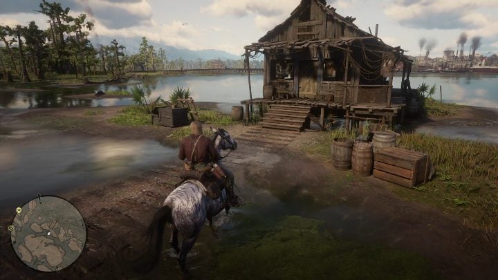 Jedną z chat znajdziesz na mokradłach, jadąc na południe od Caliga Hall - Red Dead Redemption 2: Chaty - mapy, porady - Red Dead Redemption 2 - poradnik do gry