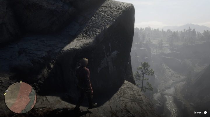 Petroglif znajduje się na skale po lewej stronie - Red Dead Redemption 2: Petroglify, rysunki naskalne - gdzie znaleźć? Lista - Red Dead Redemption 2 - poradnik do gry