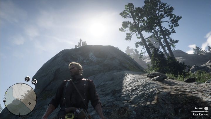 Petroglif znajduje się na skale dokładnie przy ścieżce, nie musisz więc z niej schodzić - Red Dead Redemption 2: Petroglify, rysunki naskalne - gdzie znaleźć? Lista - Red Dead Redemption 2 - poradnik do gry