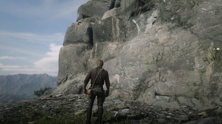 Idąc wzdłuż ścieżki trafisz na petroglif, znajduje się on skale po prawej stronie - Red Dead Redemption 2: Petroglify, rysunki naskalne - gdzie znaleźć? Lista - Red Dead Redemption 2 - poradnik do gry