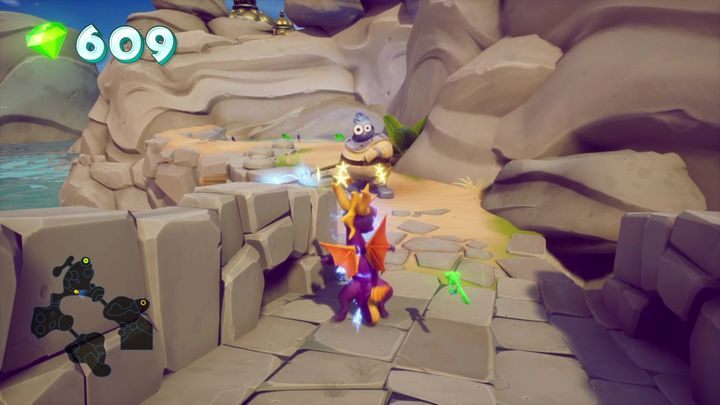 Wypłyniesz w czymś co przypomina kamienną arenę - Słoneczne Piaski - Solucja Spyro 2 Riptos Rage! - Spyro Reignited Trilogy - poradnik do gry