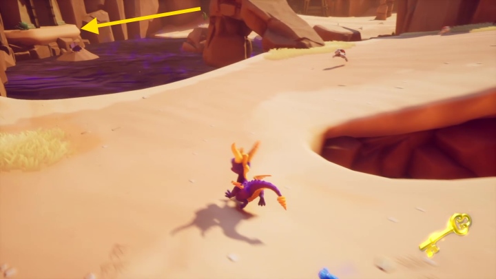 Wracając wykorzystując półkę skalną, przeskocz do kolejnej jaskini - Strażnicy Pokoju - Solucja Spyro the Dragon - Spyro Reignited Trilogy - poradnik do gry