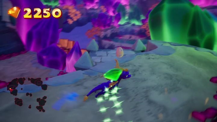 Za pomocą bramy turbolotu możesz dostać się na dach budynku do którego wchodzisz po zeskoku z lokacji startowej - Jajka | Tajemnice i Sekrety w Spyro: Year Of The Dragon - Spyro Reignited Trilogy - poradnik do gry