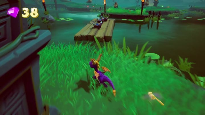 Na lewo od przejścia do Drewnianej osady znajdziesz drewnianą kładkę - Twórcy Potworów - Solucja Spyro the Dragon - Spyro Reignited Trilogy - poradnik do gry