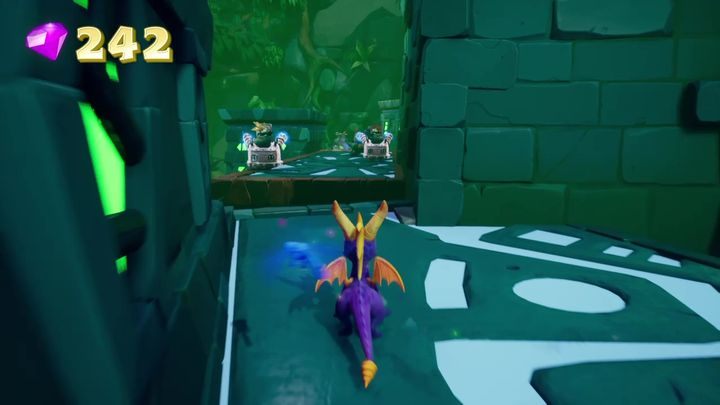 Na końcu ścieżki znajdziesz teleport, który wyniesie cię na wyższe partie poziomu - Drewniana osada - Solucja Spyro the Dragon - Spyro Reignited Trilogy - poradnik do gry