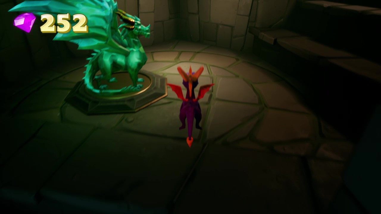 Damian znajduje się w jaskini, do której dotrzesz skacząc z pomostu na wyspę z opancerzonym trollem i klatką z kurą - Smoki do odnalezienia w Spyro the Dragon - Spyro Reignited Trilogy - poradnik do gry