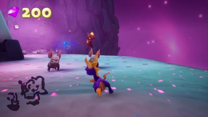 Trafisz tam do kolejnego tunelu, który prowadzi na dość spory rozmiarów platformę - Mroczny labirynt - Solucja Spyro the Dragon - Spyro Reignited Trilogy - poradnik do gry