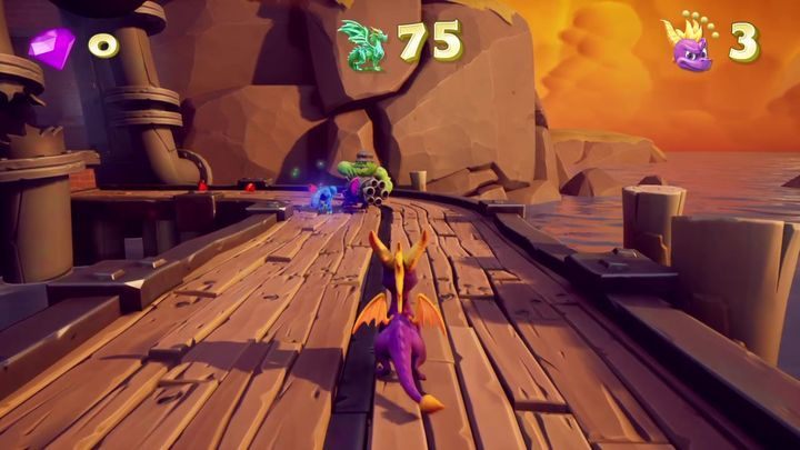 Zaczynasz od niewielkiego pomostu - Pomarańczowa przystań - Solucja Spyro the Dragon - Spyro Reignited Trilogy - poradnik do gry