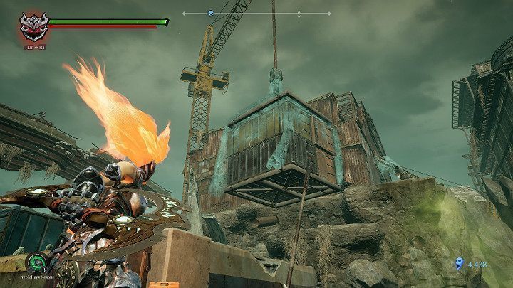 Podjedź do dźwigu i za pomocą Zbawienia spal pajęczynę trzymającą ładunek w powietrzu - Drzewo wisielca - Darksiders 3 - poradnik do gry