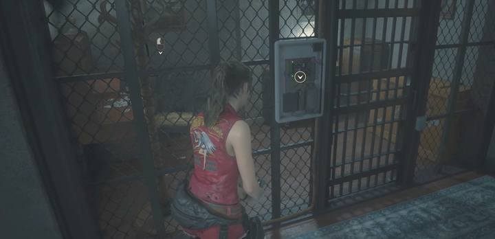 Przedostań się przez tą kratę, by zdobyć identyfikator i uciec z posterunku przez parking - Zdobycie identyfikatora i ucieczka | Posterunek policji w Resident Evil 2 - Resident Evil 2 - poradnik do gry