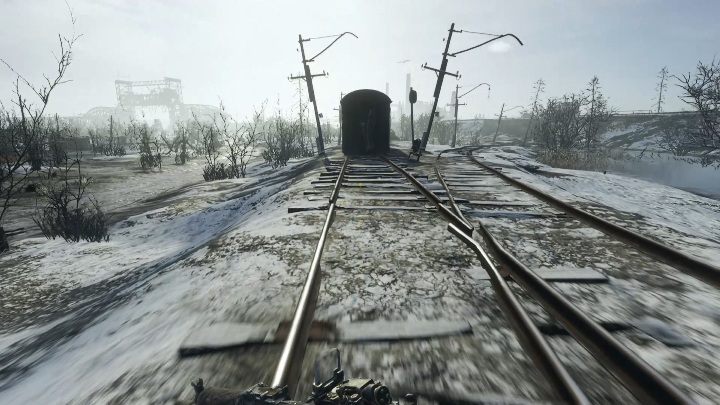 Mniej więcej na środku torów natrafisz na opuszczony wagon - Metro Exodus: Wołga - Ulepszenia i ciekawe miejsca, mapa, lista - Metro Exodus - poradnik do gry