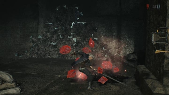 Idź teraz do końca tunelu i zniszcz naruszoną ścianę, by zdobyć trochę czerwonych kryształów - Misja 03 - Latający łowca - Solucja Devil May Cry 5 - Devil May Cry 5 - poradnik do gry