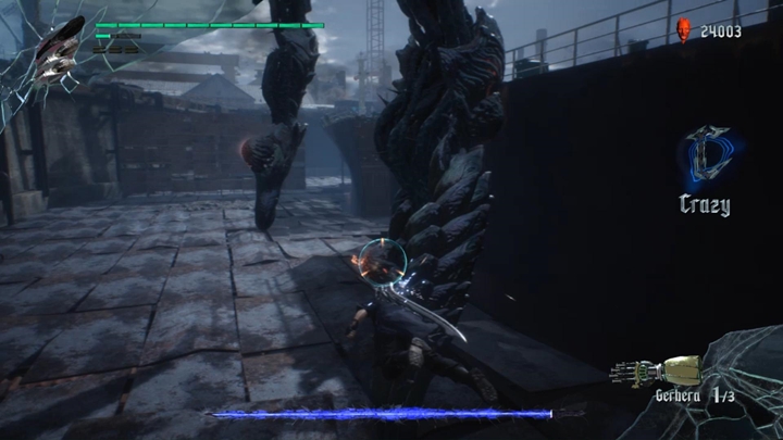 Unikaj ataków wroga, który zacznie do ciebie strzelać laserami i staraj się bić nogi potwora - Misja 06 - Stalowe zderzenie - Solucja Devil May Cry 5 - Devil May Cry 5 - poradnik do gry