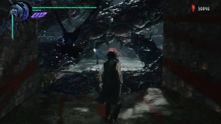 W końcu dotrzesz do sporej otwartej przestrzeni, gdzie natkniesz się na wielu wrogów, w tym Behemotha, Rioty, czy Proto Angelo - Misja 09 - Genesis - Solucja Devil May Cry 5 - Devil May Cry 5 - poradnik do gry