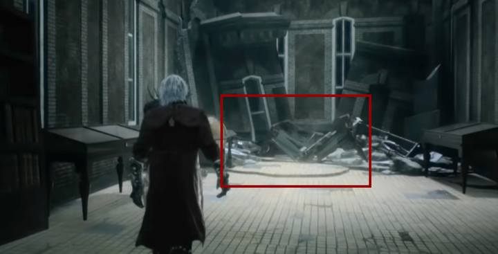 Pokój wydaje się pusty, jednak gdy podejdziesz do fragmentu uszkodzonej ściany, przy bohaterze pojawi się znacznik interakcji nazwany - Gdzie odnaleźć drugą broń Kalina Ann w Devil May Cry 5? - Devil May Cry 5 - poradnik do gry