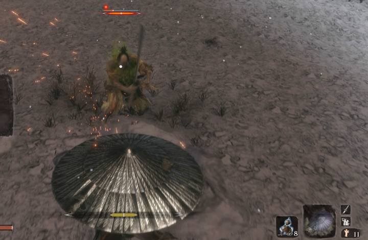 Przytrzymaj klawisz, by utrzymać swoją obronę - Wmontowany parasol | Narzędzia protezy w Sekiro Shadows Die Twice - Sekiro Shadows Die Twice - poradnik do gry