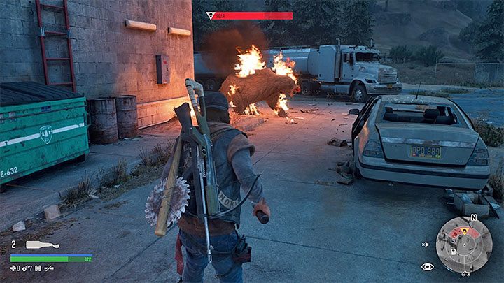 Walkę z niedźwiedziem najlepiej zacząć od rzucenia w niego koktajlem Mołotowa - Days Gone: Niedźwiedź-boss - jak zabić? - Days Gone - poradnik do gry
